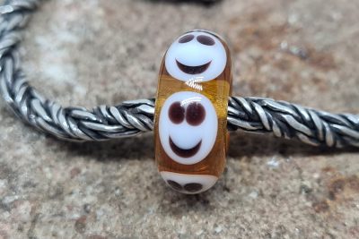 Glasbedel Smiley's Amber
