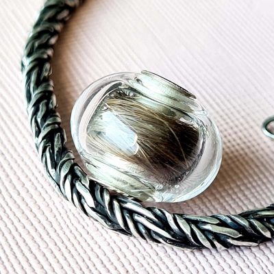 Holle Glasbedel met Plukje Haar