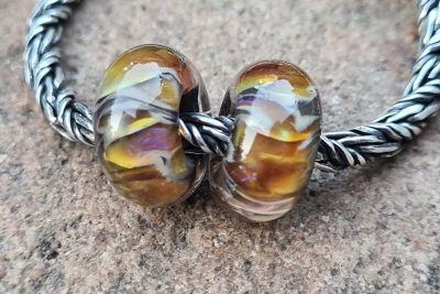 Amberkleurige bedel